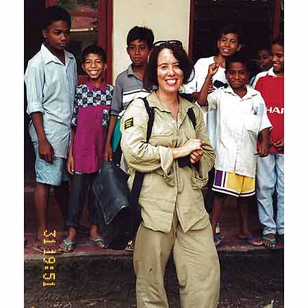 Timorese children gather around